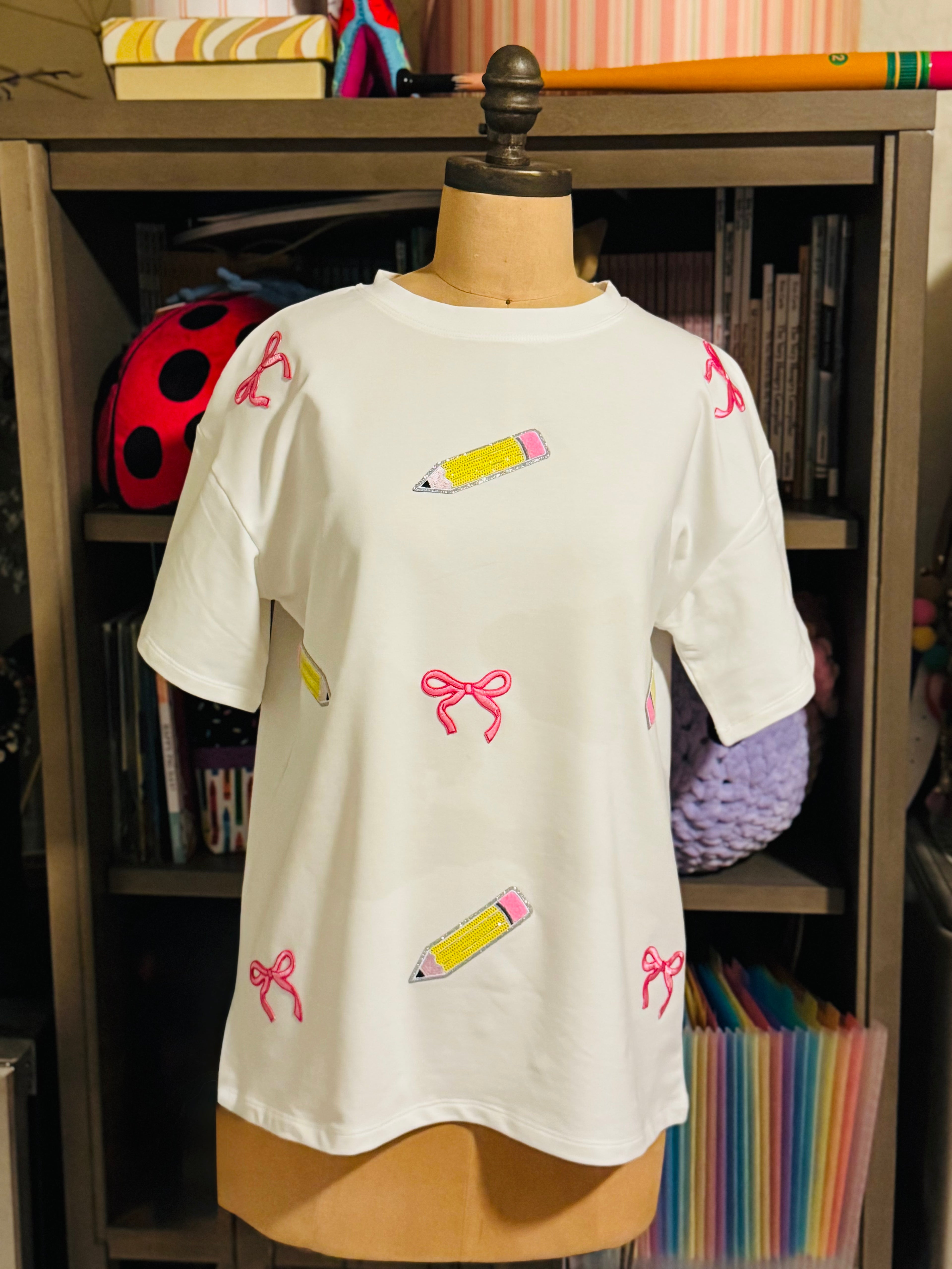 Oversized pencils & bows tee
